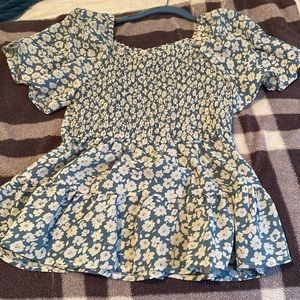 Blue and white flowery blouse